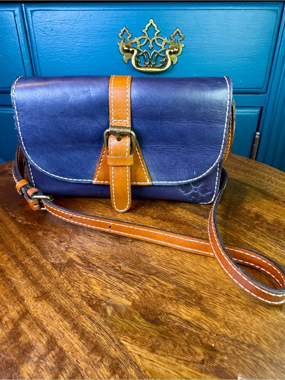 Patricia Nash Navy and Tan Leather Crossbody with Buckle Detail